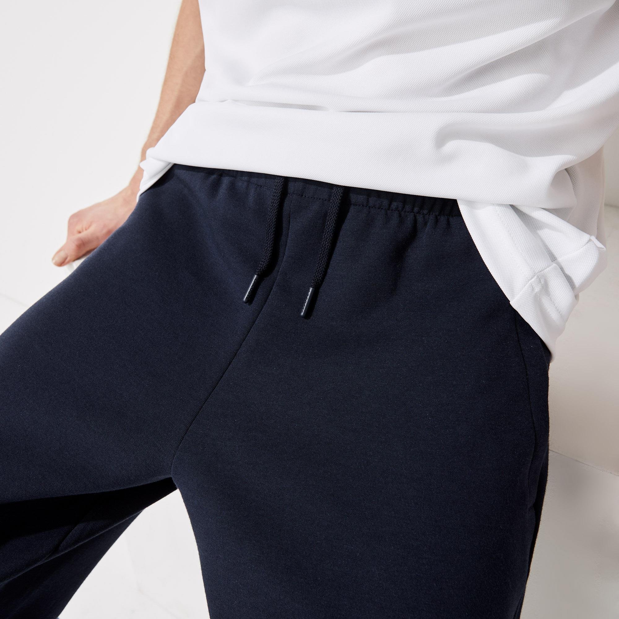 Lacoste męskie spodnie dresowe ze wstawkami z siatki