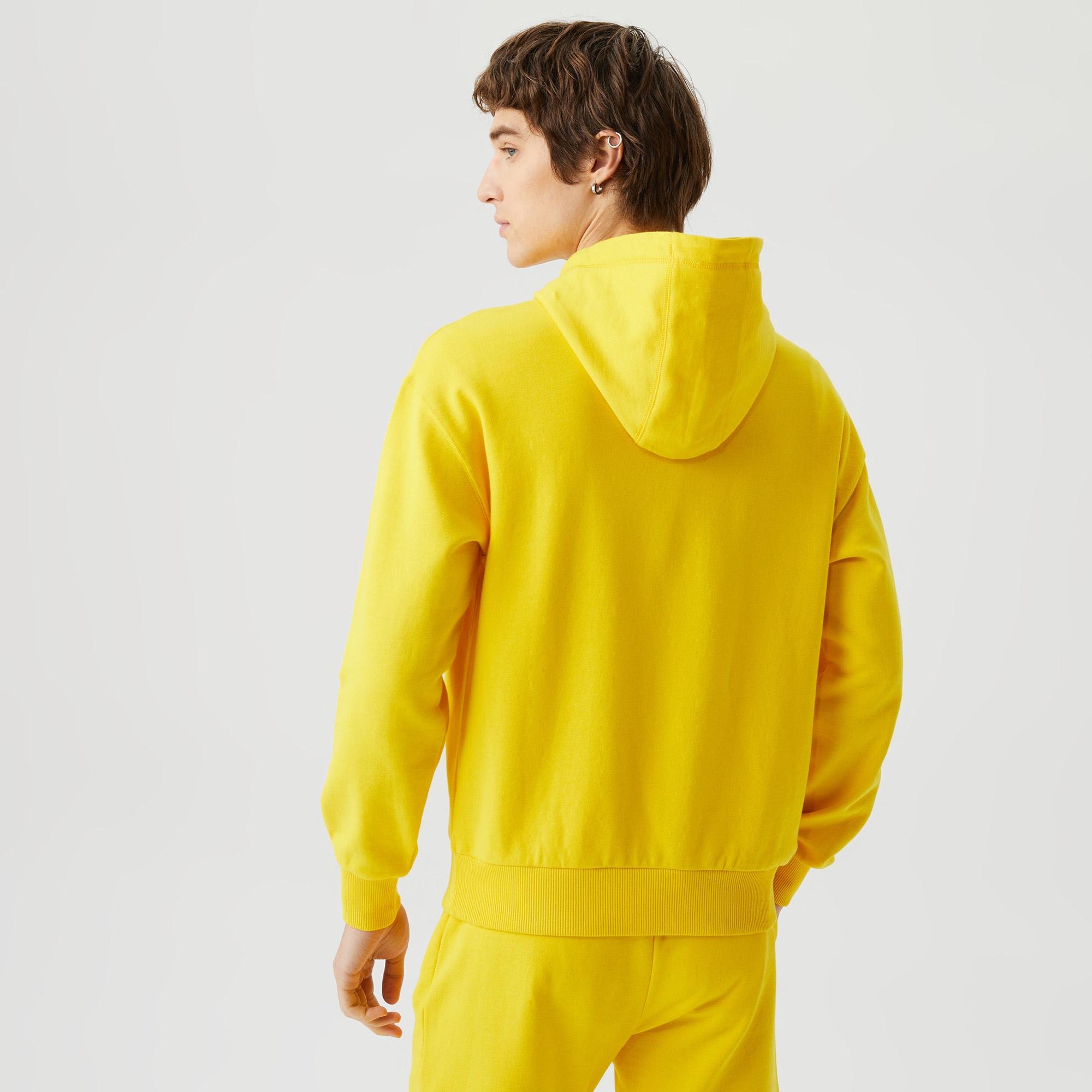 Lacoste Unisex Relaxed Fit Kapüşonlu Baskılı Sarı Sweatshirt. 3