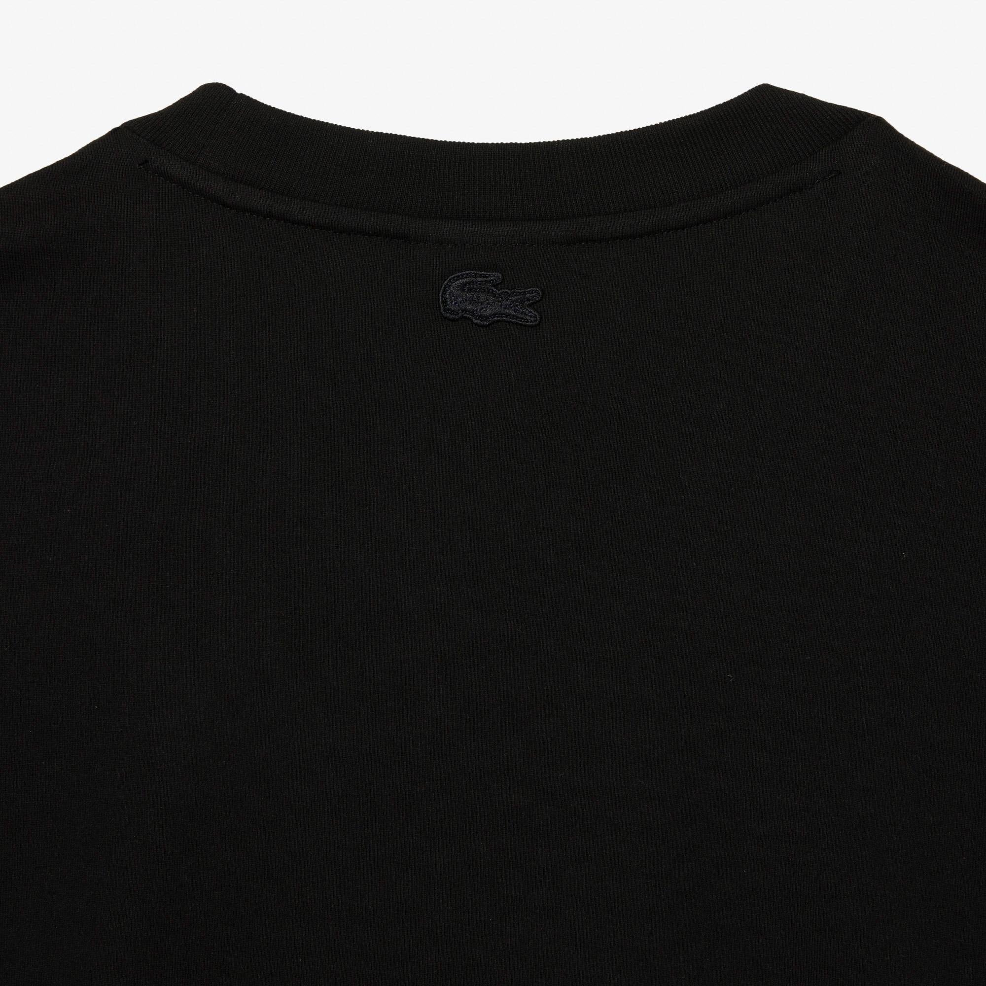 Lacoste x Netflix Erkek Relaxed Fit Bisiklet Yaka Baskılı Siyah T-Shirt. 6