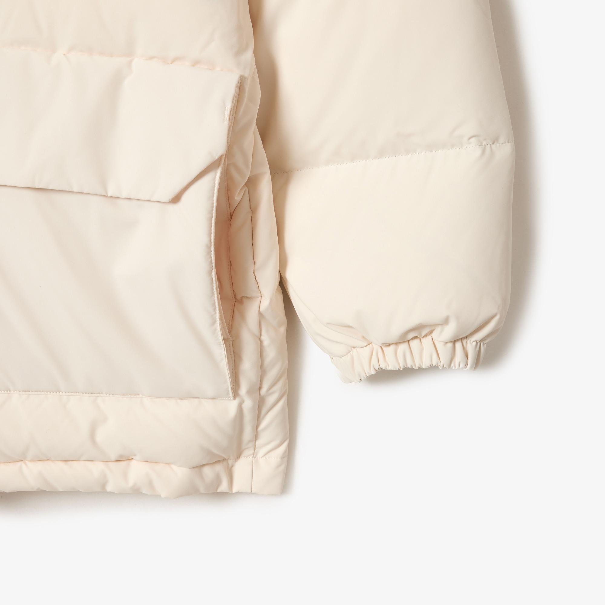 Lacoste páperová bunda strednej dĺžky a s odnímateľnou kapucňou