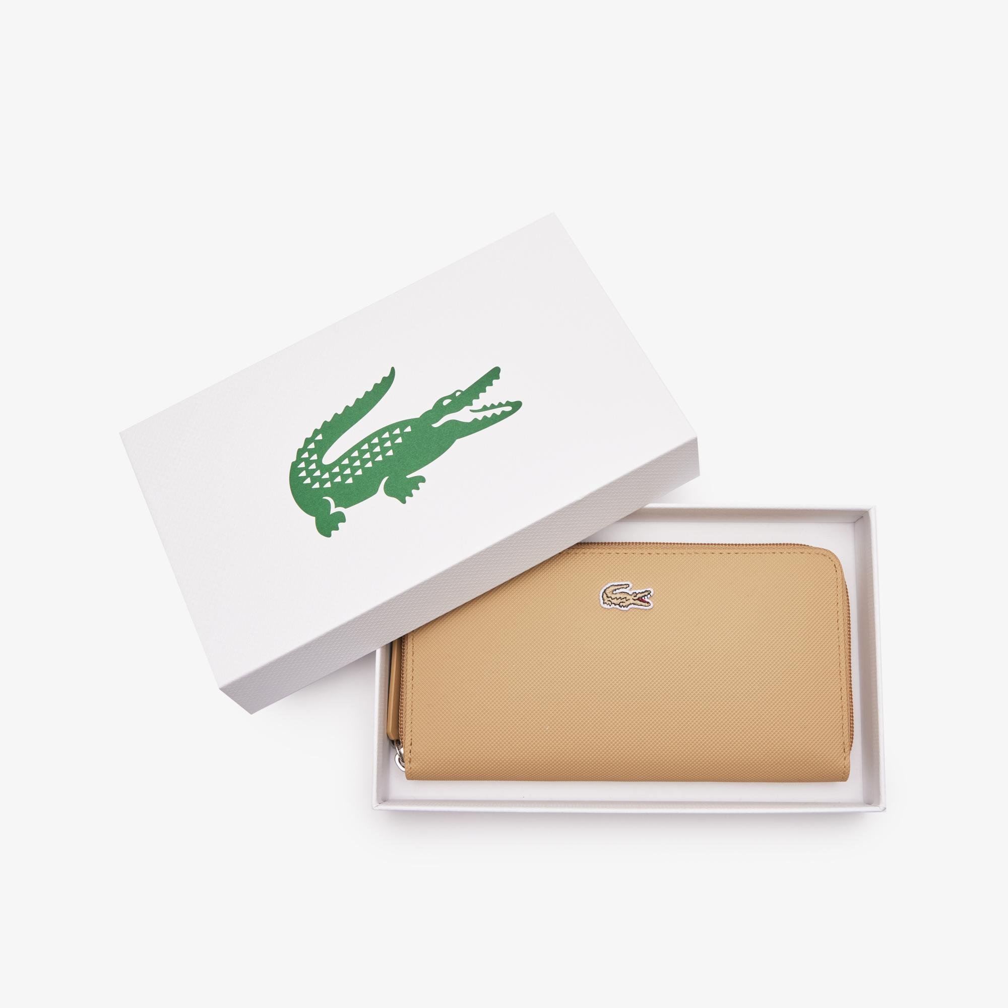 Lacoste damski portfel L.12.12 Concept o teksturze drobnej piki na 12 kart zapinany na zamek błyskawiczny